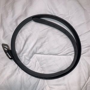 Plus size woman’s black leather belt